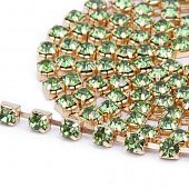 Цепь золотистая стразовая светло-зеленая, 3.5 мм.